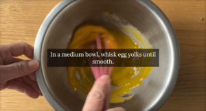 In a medium bowl, whisk egg yolks until smooth.