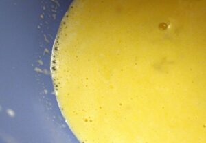 Add the rest of the corn mixture to the eggs and transfer to a blender. Puree until smooth.